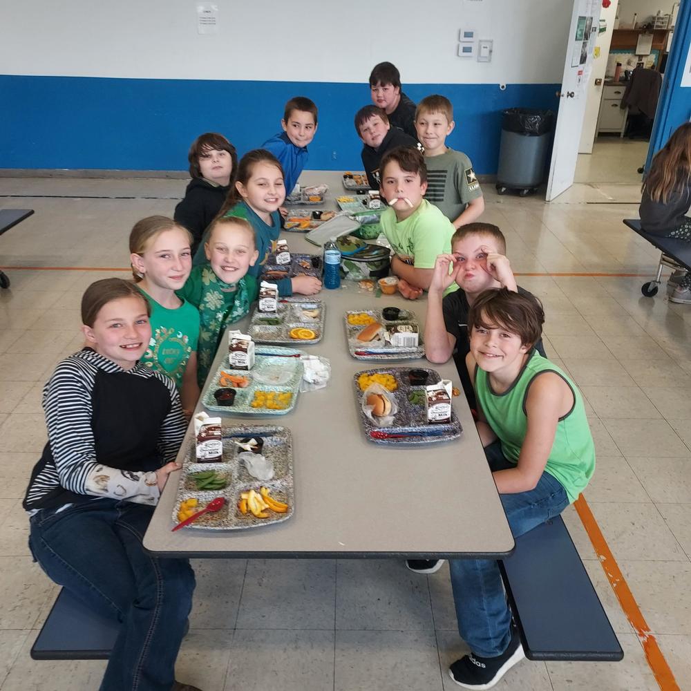 Fourth Grade enjoying the new tables during lunch.